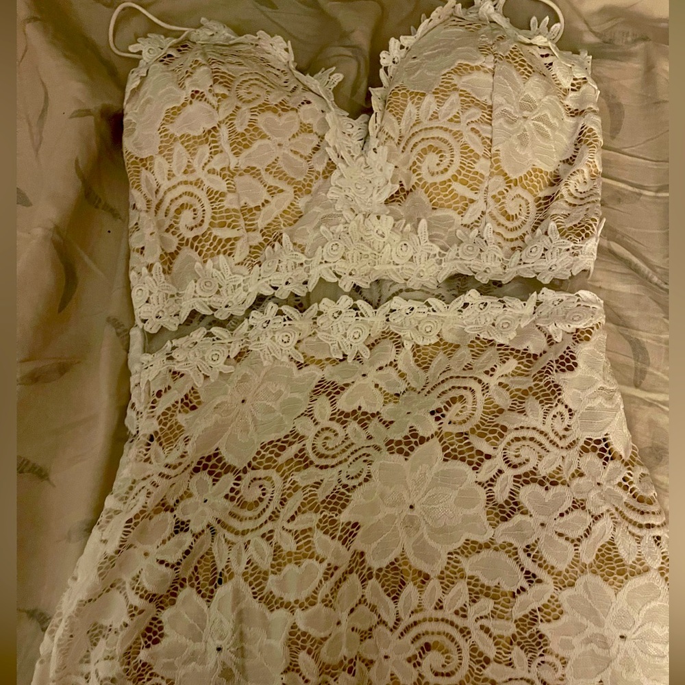 Selling a white midi dress it is a large and is true to size.